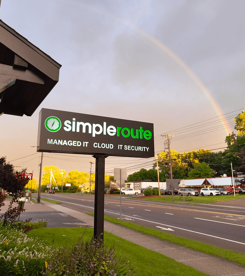 Open concept office with employees working at their desks